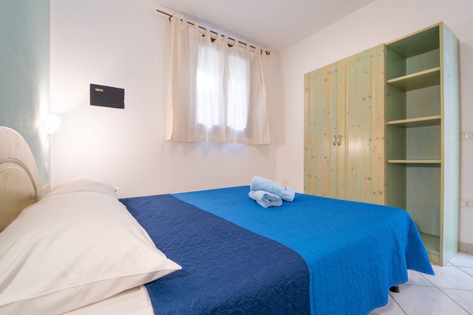 Imagen de la habitación del Residence Pendra Sardinia Costa del Turchese. Foto 6