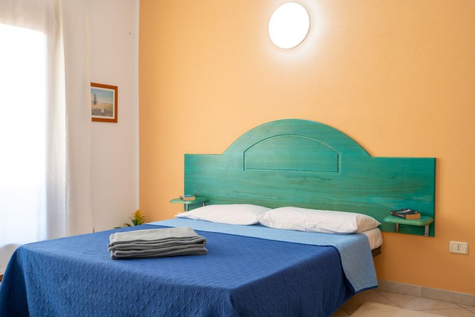 Imagen de la habitación del Residence Pendra Sardinia Costa del Turchese. Foto 7