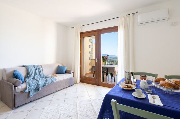 Imagen de la habitación del Residence Pendra Sardinia Costa del Turchese. Foto 16