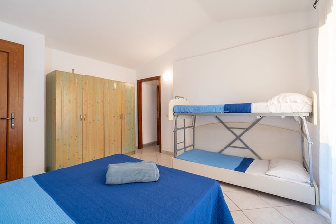 Imagen de la habitación del Residence Pendra Sardinia Costa del Turchese. Foto 18