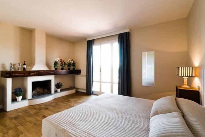 Imagen de la habitación del Residence Poggio del Golf. Foto 17