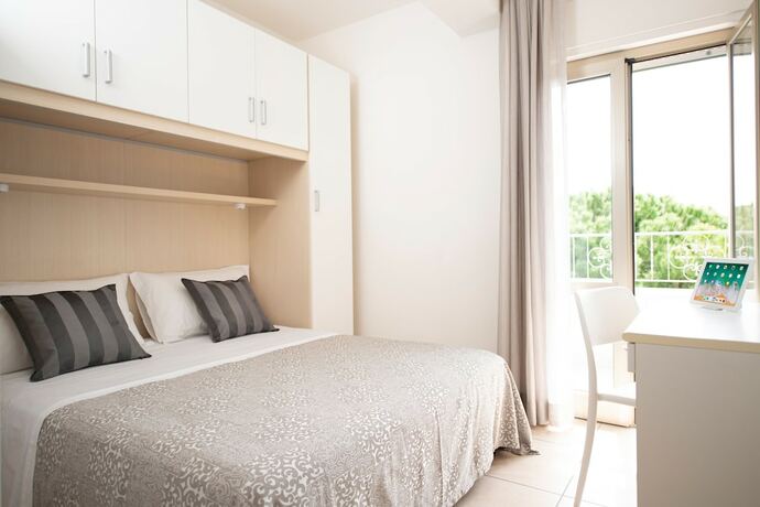 Imagen de la habitación del Residence Quadrifoglio. Foto 15