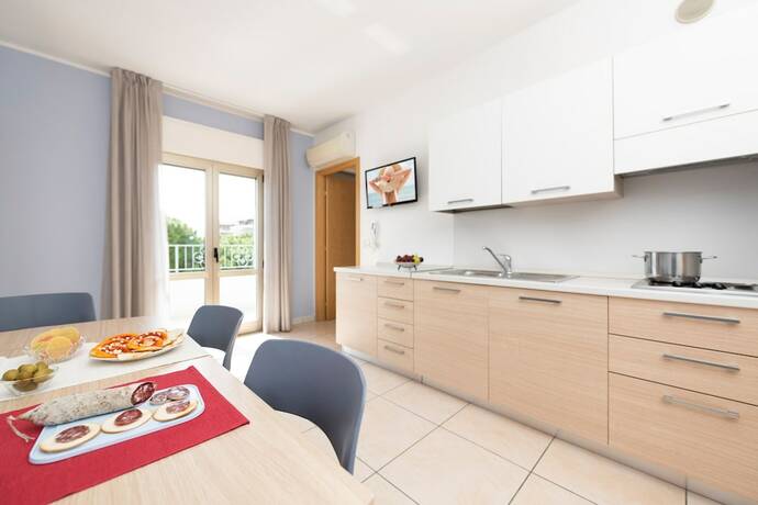Imagen de la habitación del Residence Quadrifoglio. Foto 16