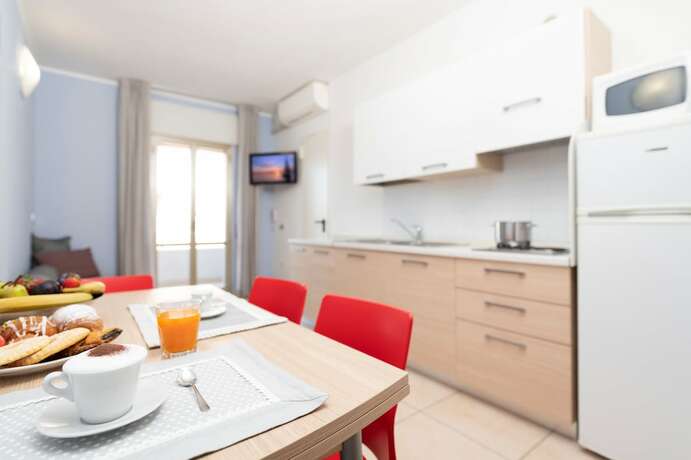 Imagen de la habitación del Residence Quadrifoglio. Foto 17