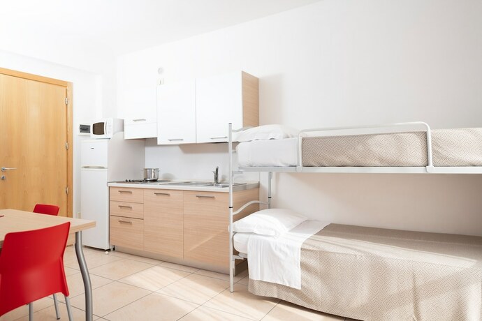 Imagen de la habitación del Residence Quadrifoglio. Foto 19