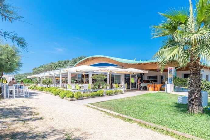 Imagen del bar/restaurante del Residence Robinia Pinetine. Foto 3