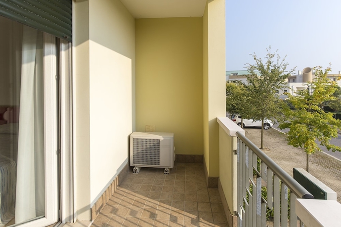 Imagen de la habitación del Residence Robinia Pinetine. Foto 12