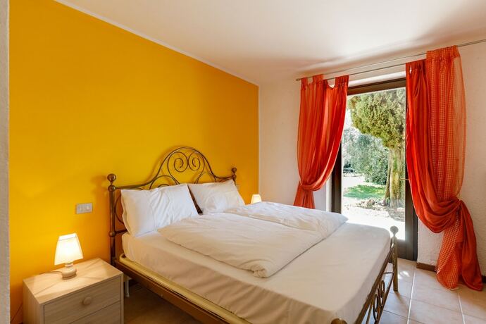Imagen de la habitación del Residence Rustico. Foto 16
