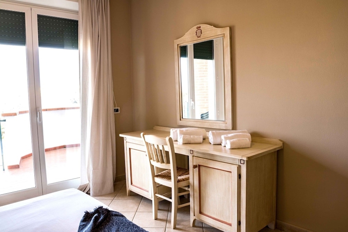 Imagen de la habitación del Residence Santa Costanza. Foto 4