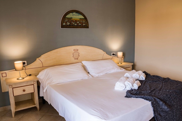 Imagen de la habitación del Residence Santa Costanza. Foto 5