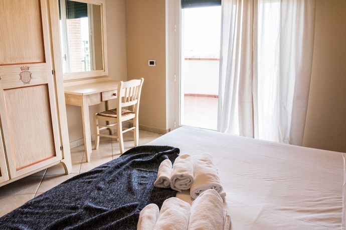 Imagen de la habitación del Residence Santa Costanza. Foto 6