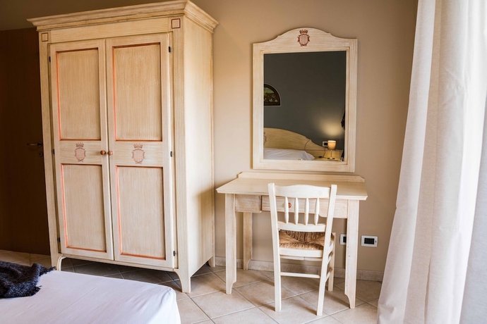 Imagen de la habitación del Residence Santa Costanza. Foto 7