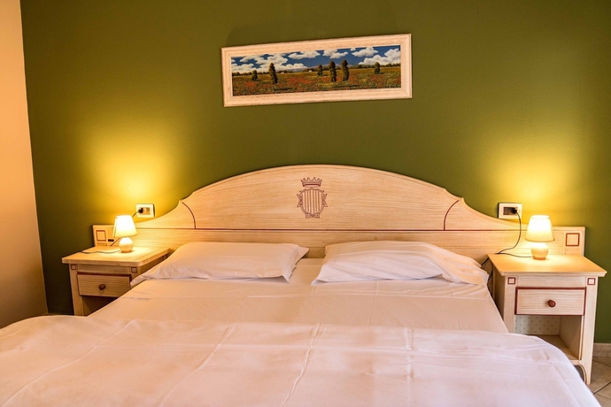 Imagen de la habitación del Residence Santa Costanza. Foto 10