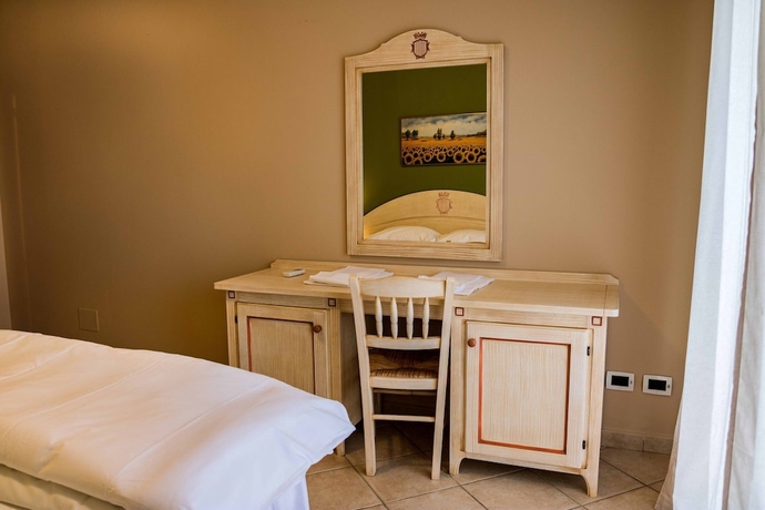 Imagen de la habitación del Residence Santa Costanza. Foto 11