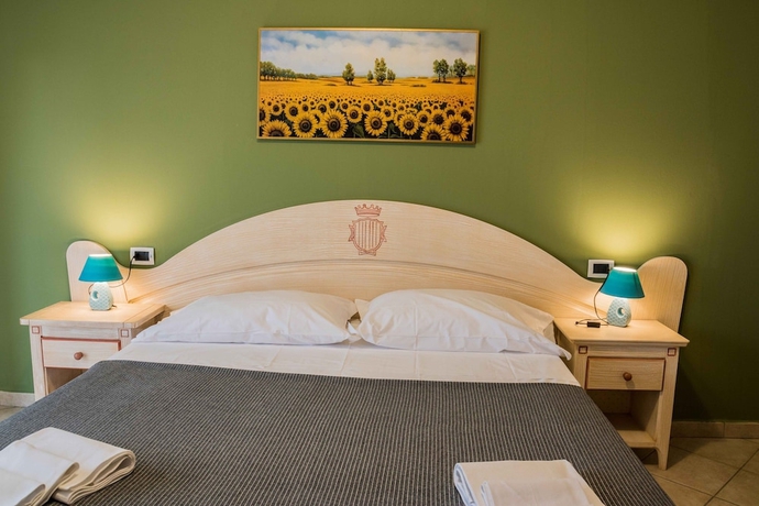 Imagen de la habitación del Residence Santa Costanza. Foto 12