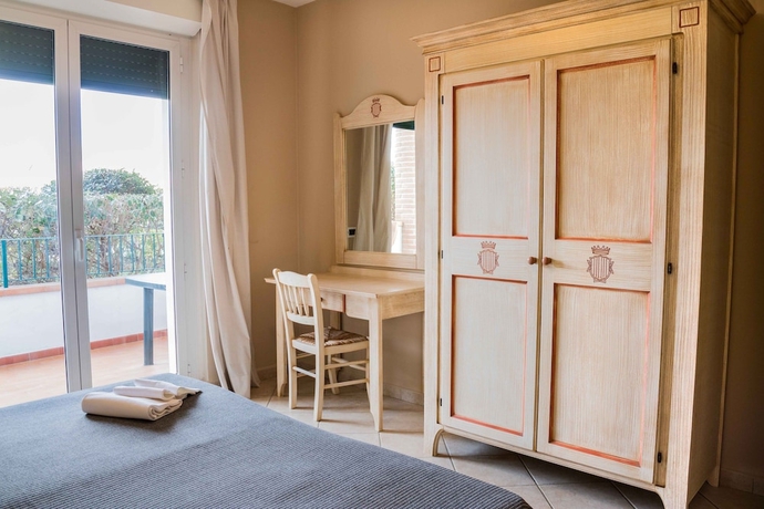 Imagen de la habitación del Residence Santa Costanza. Foto 13