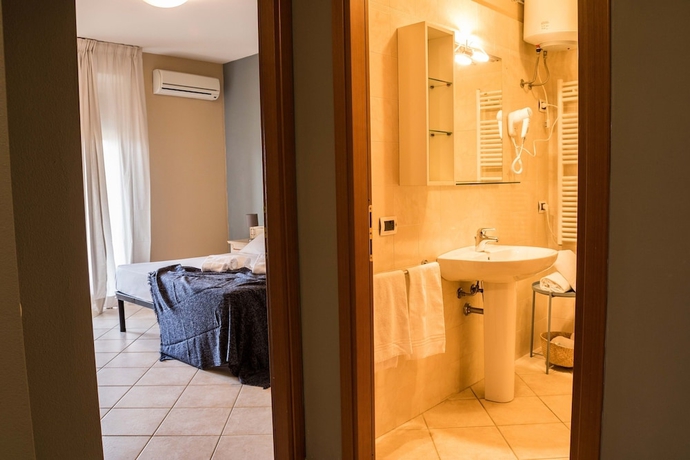 Imagen de la habitación del Residence Santa Costanza. Foto 15