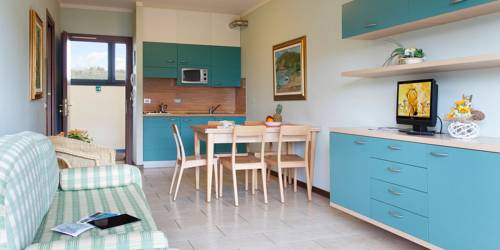 Imagen de la habitación del Residence Spiaggia D'oro. Foto 4