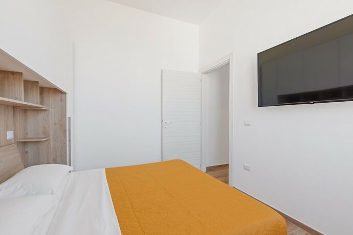 Imagen de la habitación del Residence Torvaianica. Foto 12