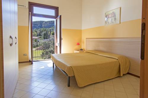 Imagen de la habitación del Residence Uliveto. Foto 6