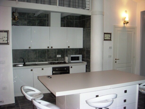 Imagen de la habitación del Residence Vecchio Porto Excelsior. Foto 17