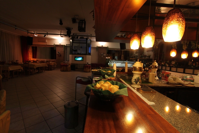 Imagen del bar/restaurante del Residence Villa Patrizia. Foto 5