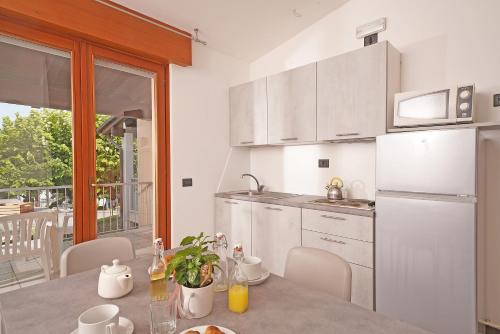 Imagen de la habitación del Residence Villaggio Tiglio. Foto 3