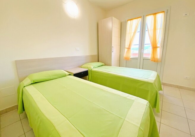 Imagen de la habitación del Residence just 600 meters from the beach. Foto 20