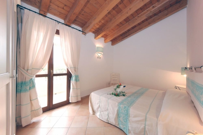 Imagen de la habitación del Residence with pool in Vignola Mare. Foto 6