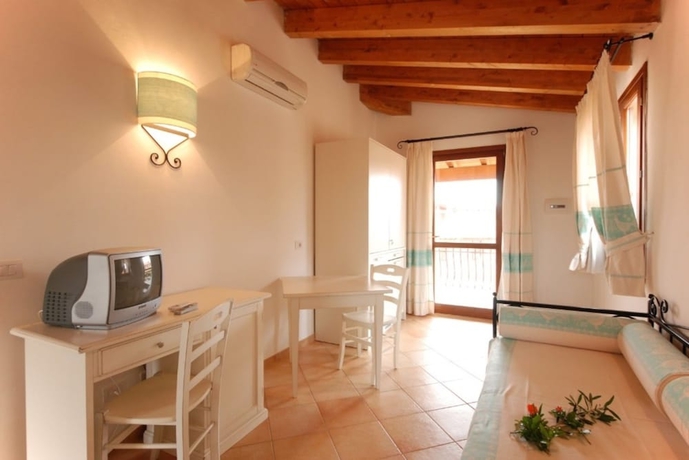 Imagen de la habitación del Residence with pool in Vignola Mare. Foto 11