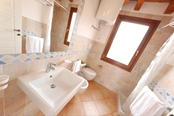 Imagen de la habitación del Residence with pool in Vignola Mare. Foto 14