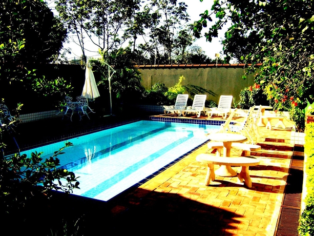 Imagen de la piscina del Residencial E Pousada Evelina. Foto 14