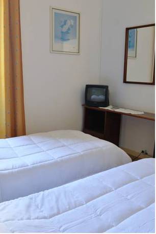 Imagen de la habitación del Residencial Moderna. Foto 16