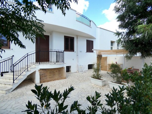 Imagen de la habitación del Residenza Arcangela - 4 Alloggi con 2 Piscine Private nel Salento - Fino a 20 Posti Letto. Foto 20