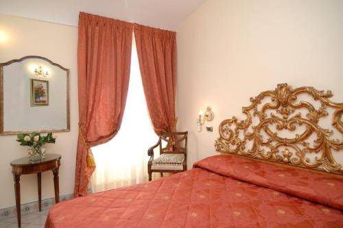 Imagen de la habitación del Residenza Del Duca Casa Vacanza. Foto 8