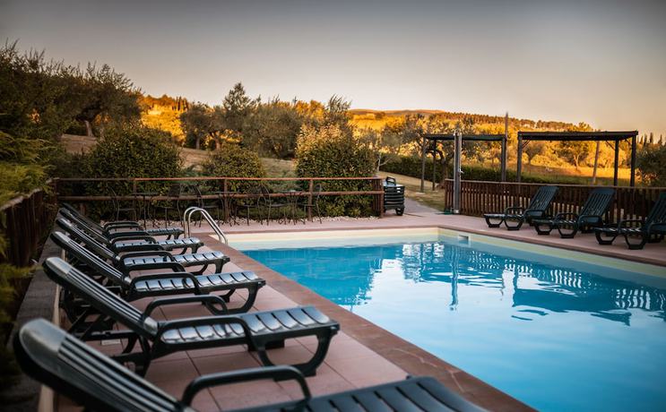 Imagen de la piscina del Residenza Il Falchetto. Foto 17