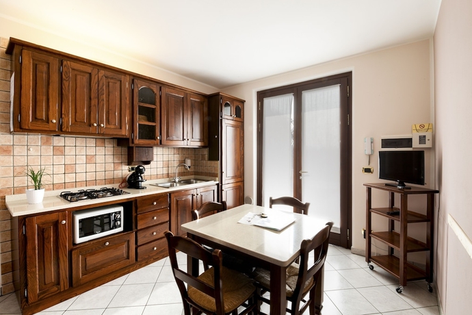 Imagen de la habitación del Residenza La Ricciolina. Foto 6