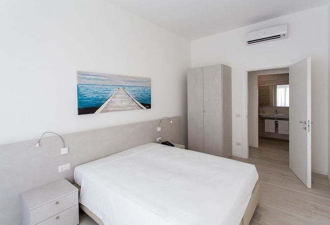 Imagen de la habitación del Residenza Turistica Alberghiera Blue Marine. Foto 2