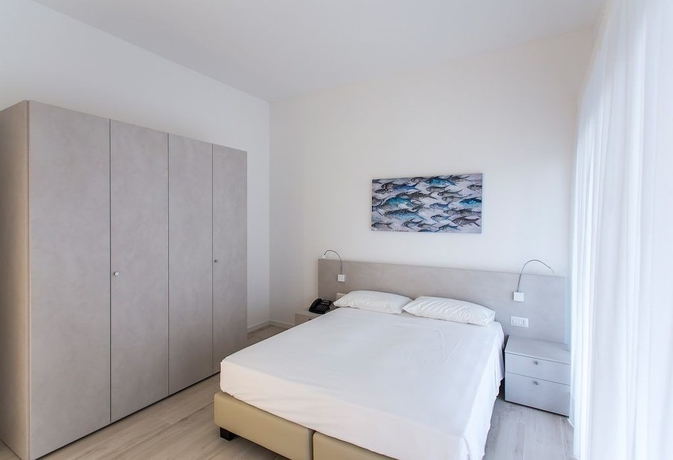 Imagen de la habitación del Residenza Turistica Alberghiera Blue Marine. Foto 10