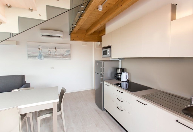 Imagen de la habitación del Residenza Turistica Alberghiera Blue Marine. Foto 12