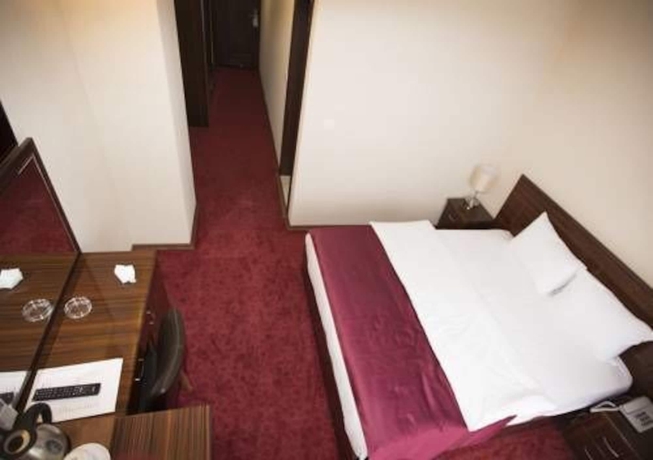 Imagen de la habitación del Resmina Hotel. Foto 7