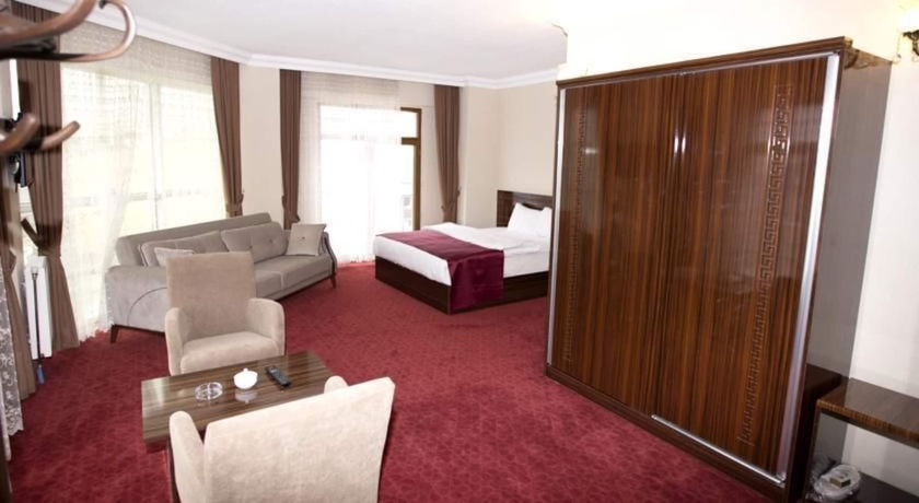 Imagen de la habitación del Resmina Hotel. Foto 10