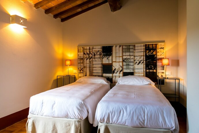 Imagen de la habitación del Resort Borgo Syrah. Foto 17