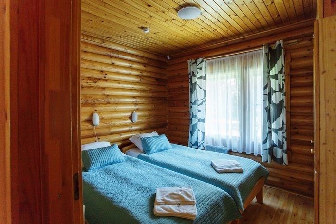 Imagen de la habitación del Resort Green Village. Foto 3
