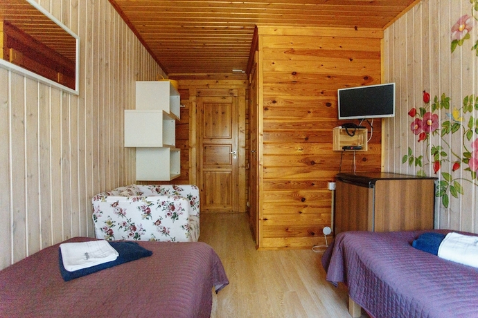 Imagen de la habitación del Resort Green Village. Foto 4