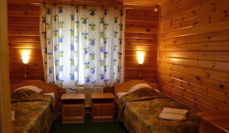 Imagen de la habitación del Resort Green Village. Foto 6