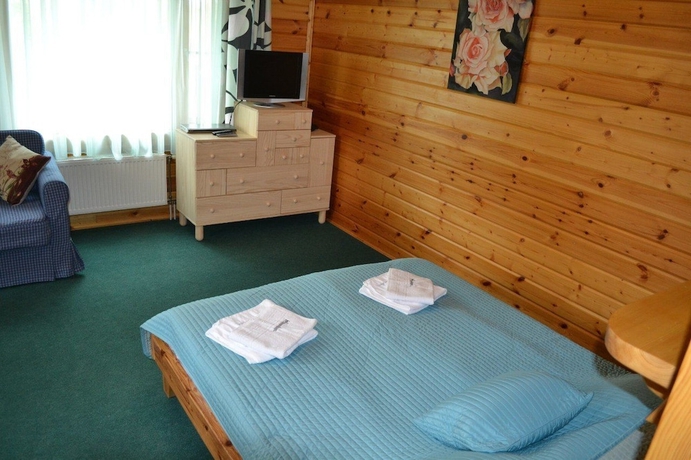 Imagen de la habitación del Resort Green Village. Foto 15