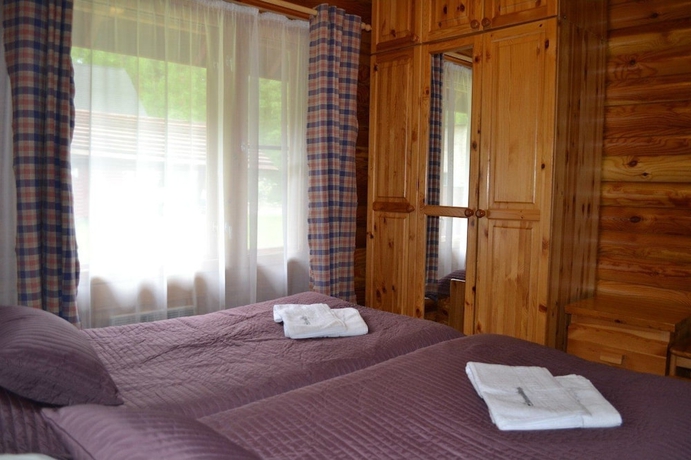 Imagen de la habitación del Resort Green Village. Foto 16