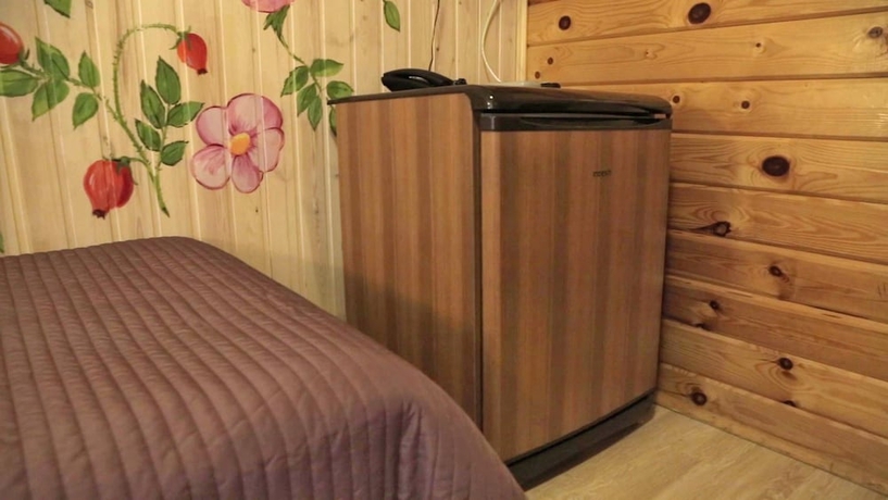 Imagen de la habitación del Resort Green Village. Foto 17