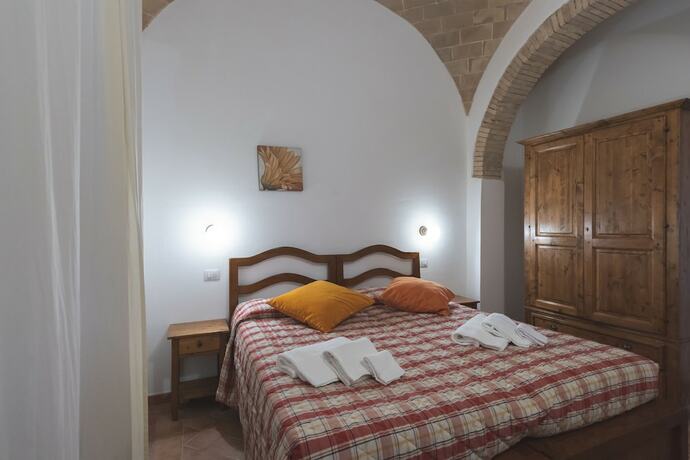 Imagen de la habitación del Resort Le Tegole. Foto 19